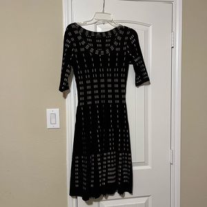 Scoop neck sweater dress in Black and Tan